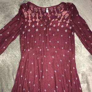 Maroon long sleeve dress.